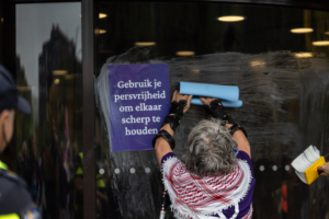 Extinction Rebellion trying to glue the NOS building